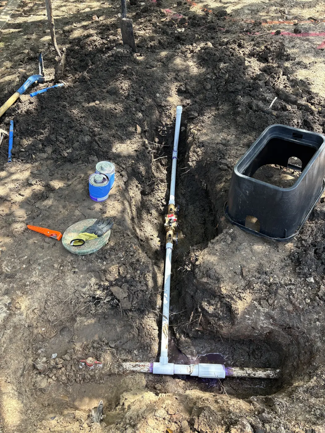 Sprinkler repair components installed in the ground