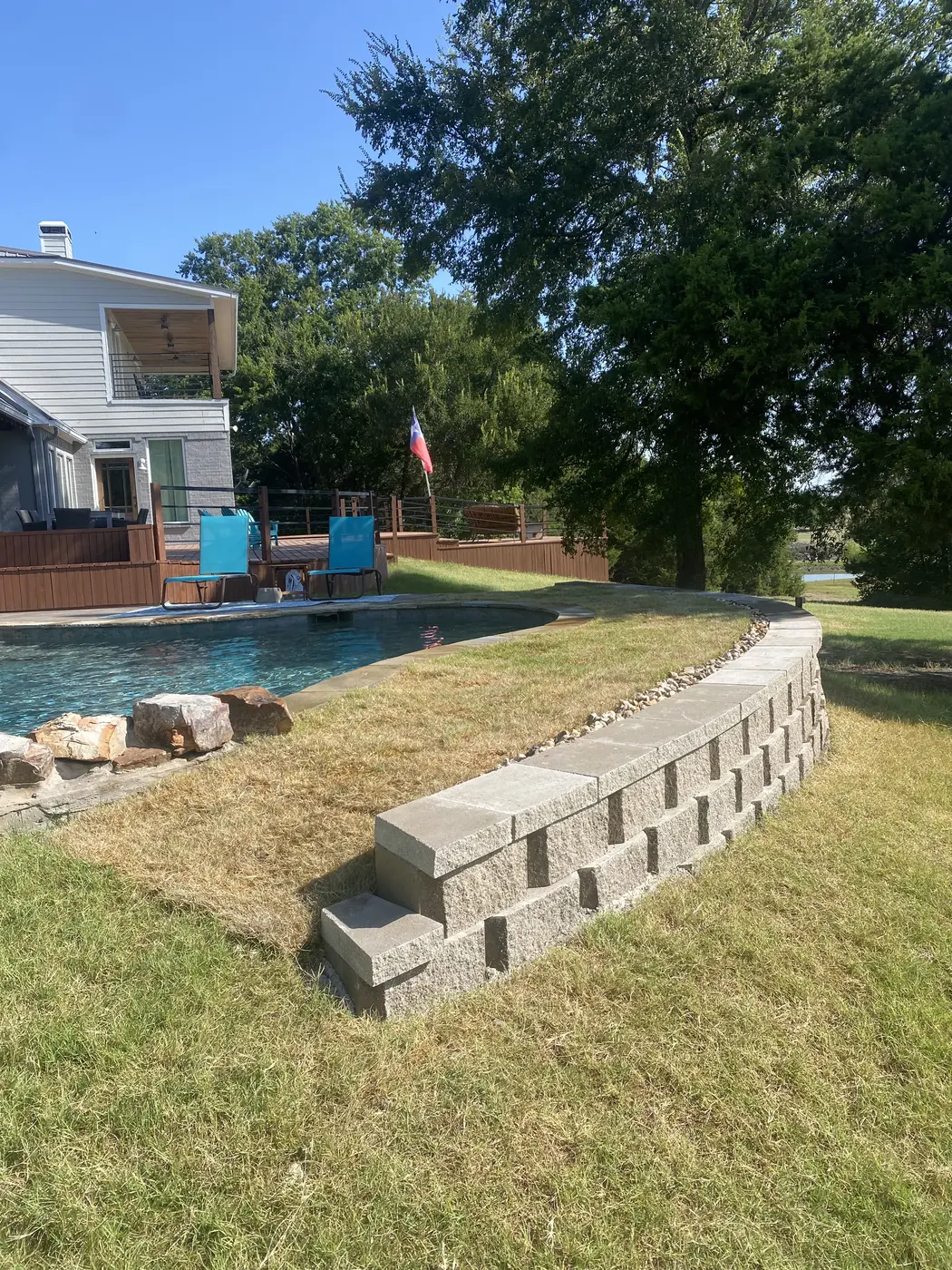 Finished stone landscape wall at a residential property